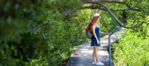 A woman on a hiking trail in Fort Lauderdale.
